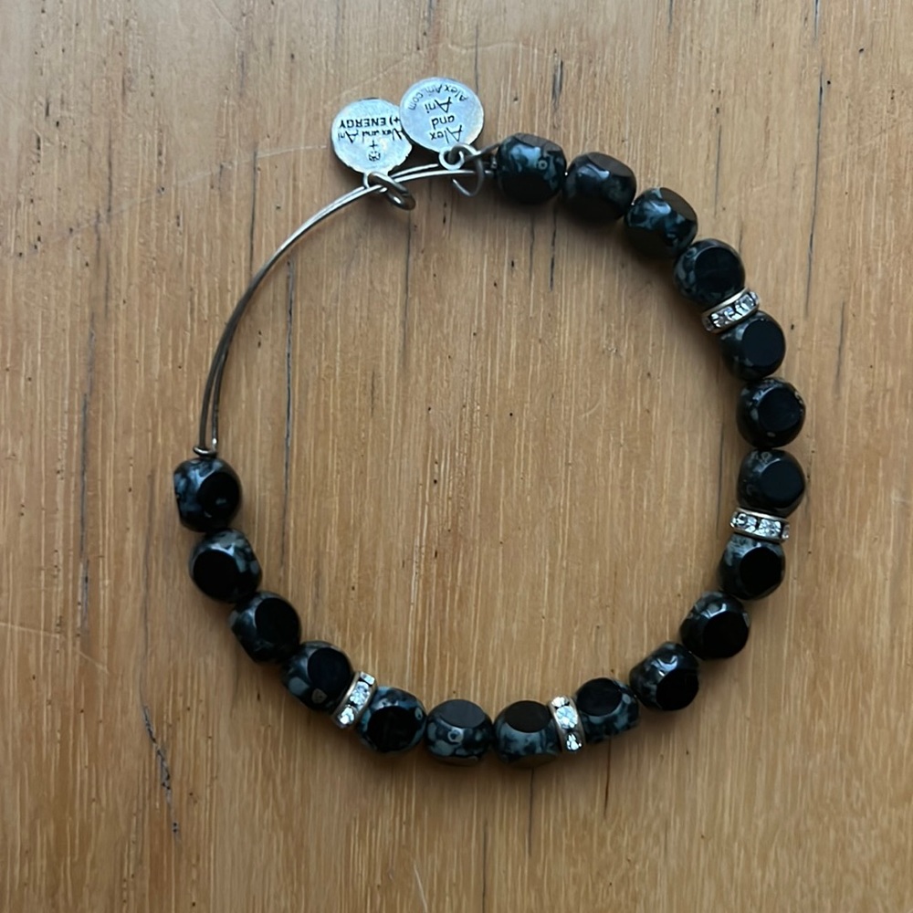 Black beaded Alex and Ani bracelet.